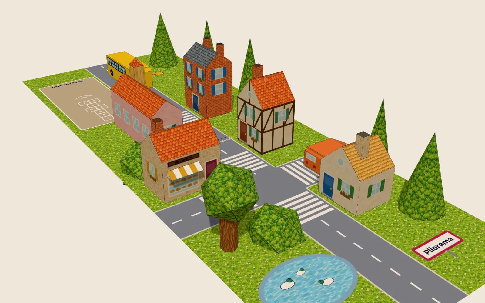 Le village en papier monté sur son plan : trois maisons, la boulangerie et son store, l’école et son clocheton, des arbres, la mare aux canards, le bus, la voiture et le panneau « Pliorama ».