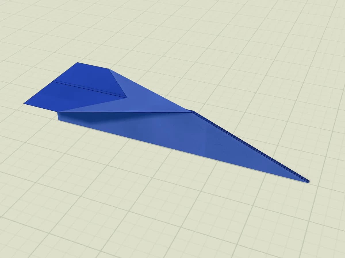 Avion en papier classique avec deux ailes de part et d’autre du corps.