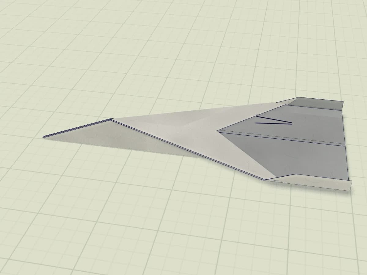 Avion de chasse en papier aux ailes horizontales et petites dérives relevées.