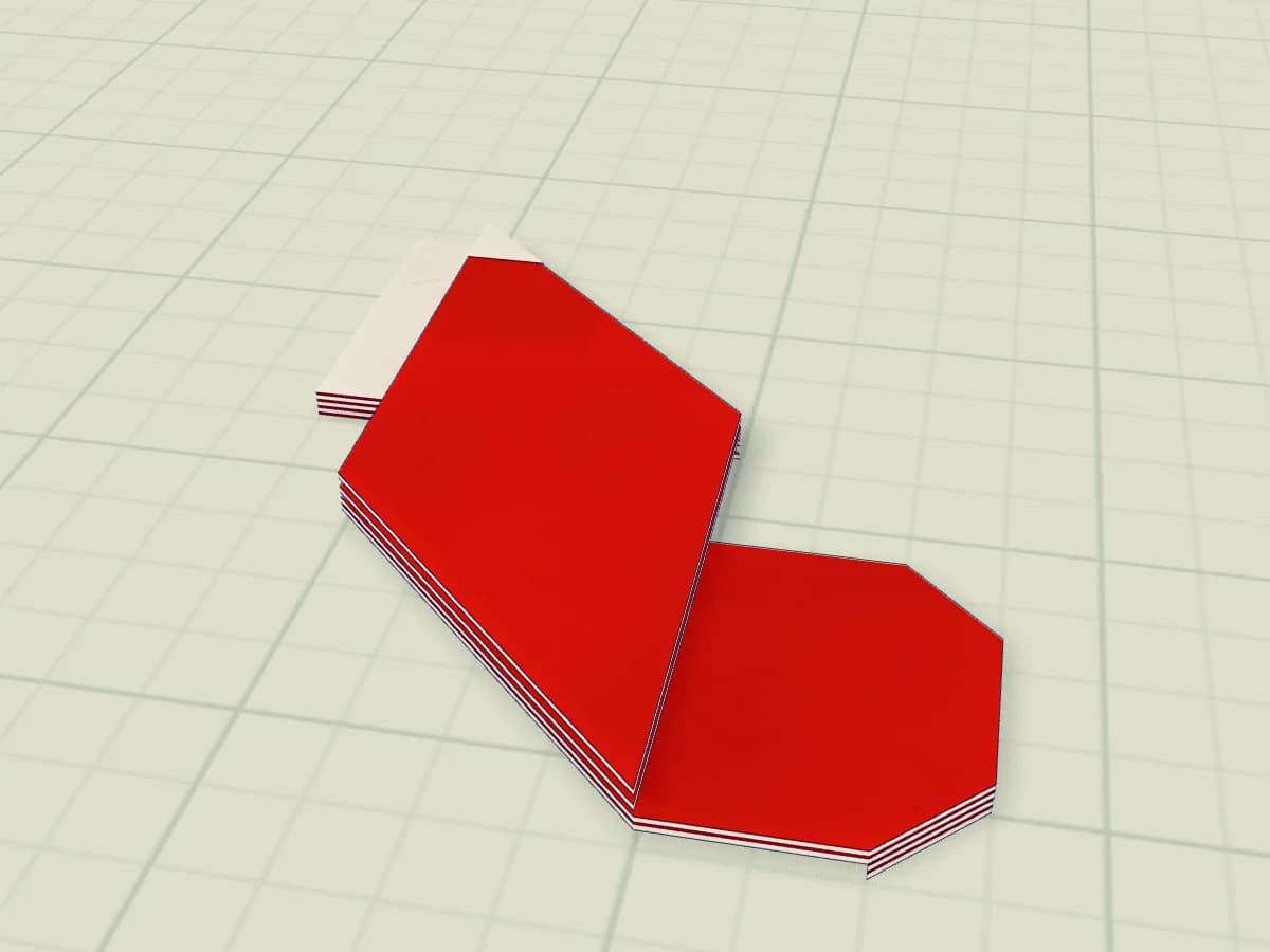 Botte plate en papier, tige haute, revers contrasté et pied sur le côté.