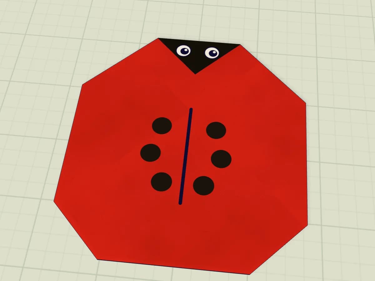 Coccinelle en origami avec points noirs et yeux blancs