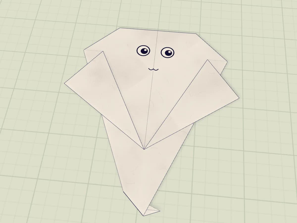 Modèle de fantôme en papier terminé, présenté à plat.