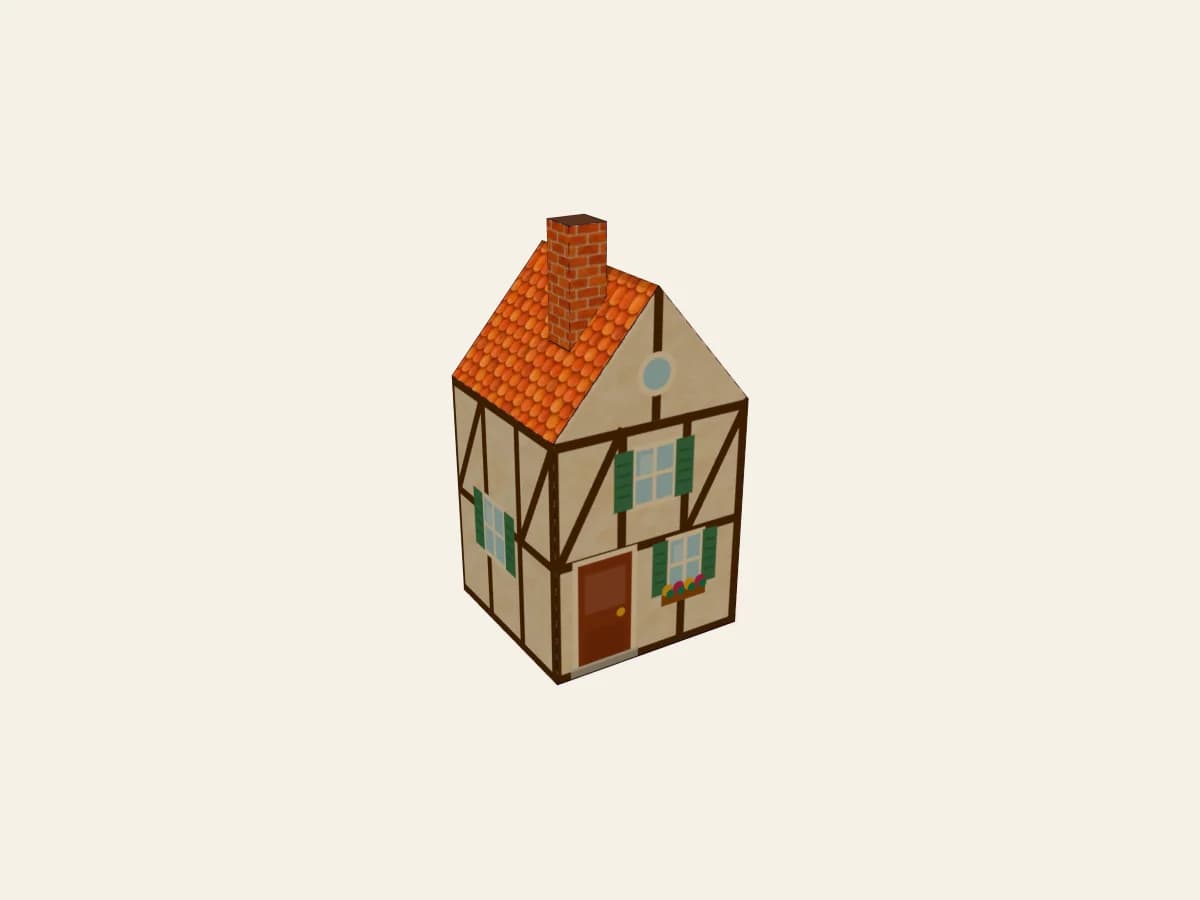 Une maison à colombages en papier sous sa forme montée.