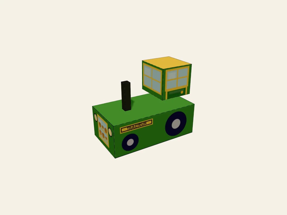 Maquette de tracteur en papier présentée après la fin du montage