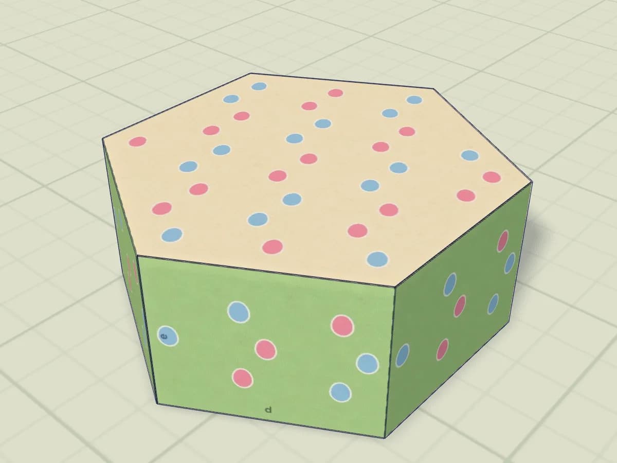 Boîte en papier en forme d’œuf de Pâques avec son couvercle.