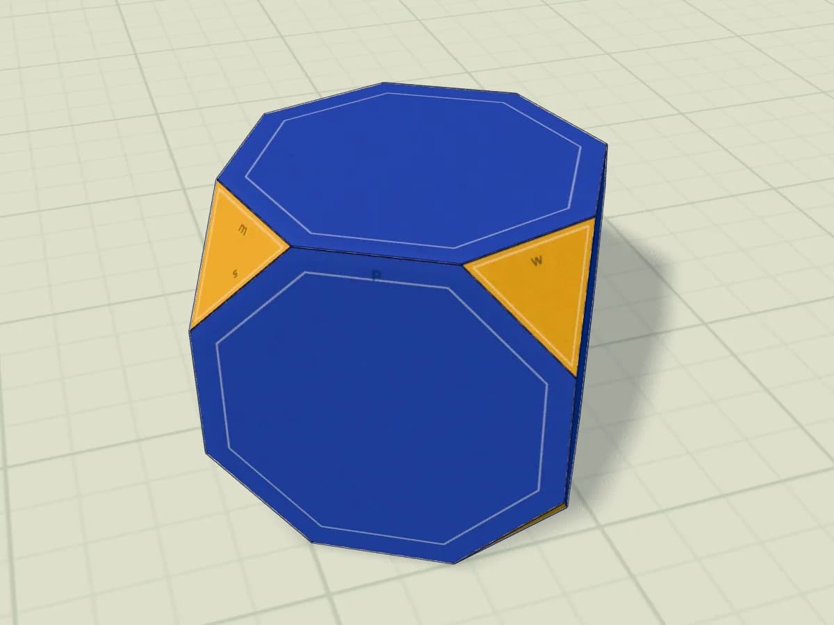 Cube tronqué en papier sous sa forme finale de solide assemblé