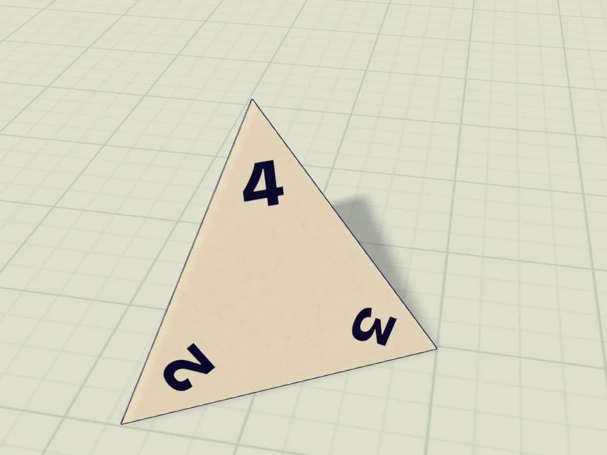 Dé en papier assemblé, avec ses pointes et ses nombres visibles
