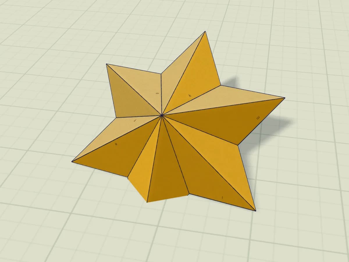 Étoile en papier à six branches, présentée en volume