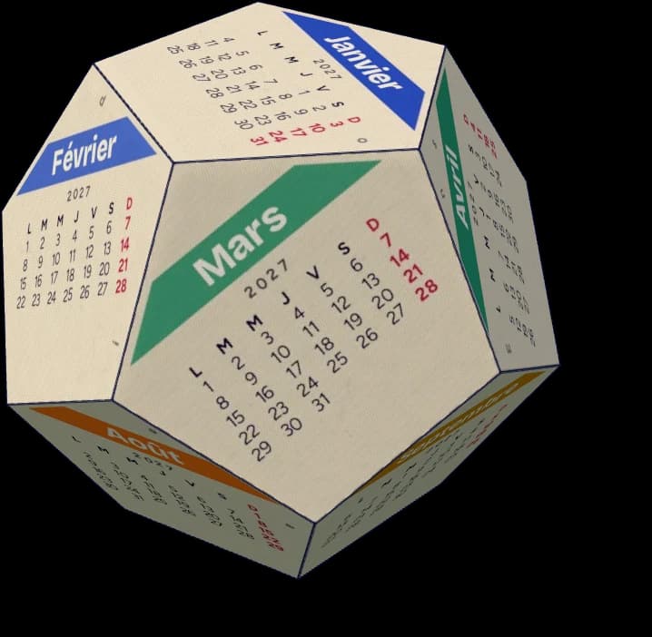 Calendrier dodécaèdre en papier assemblé, avec plusieurs mois visibles.